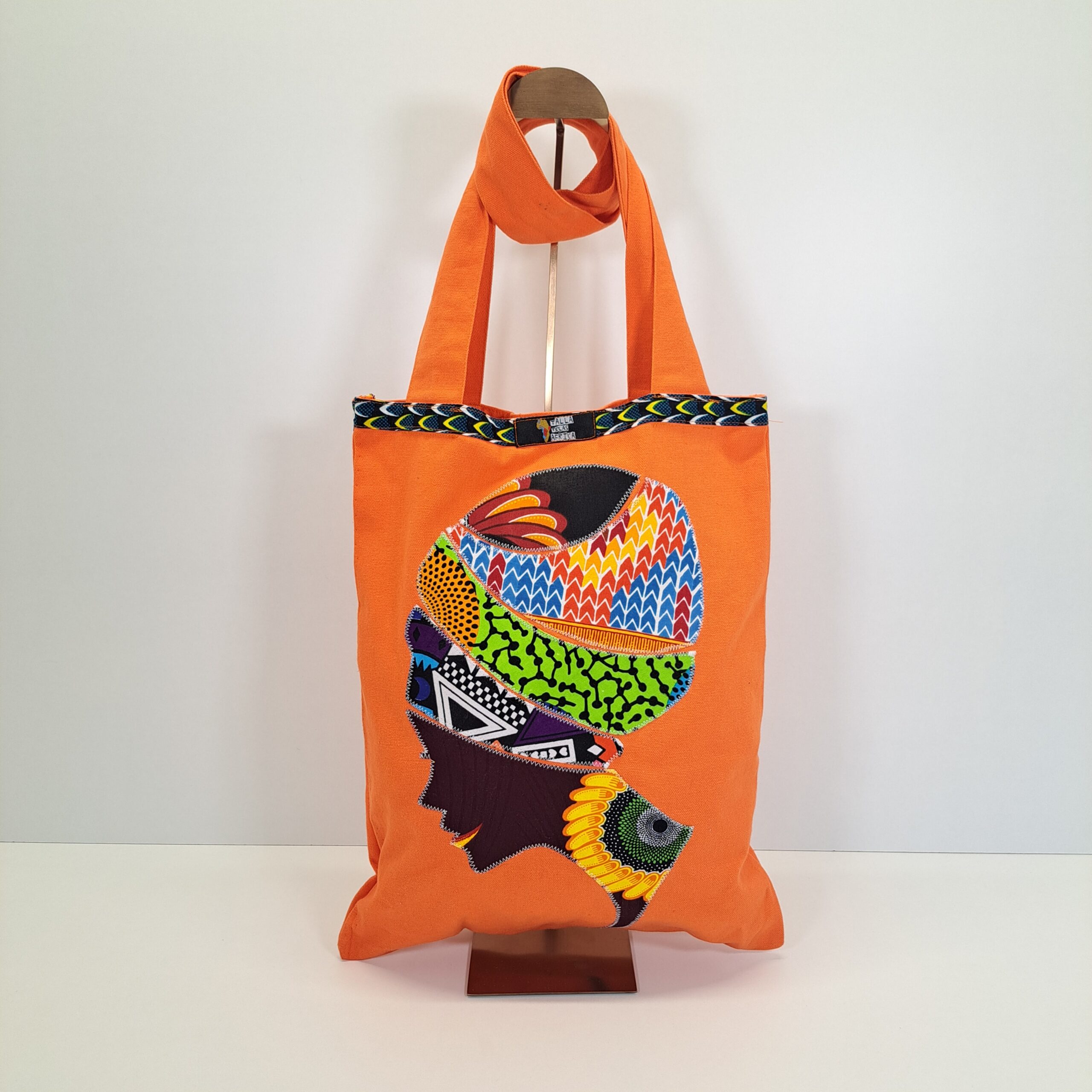 Bolsa "Turbante de la Libertad" – Diseño Único con Mosaico de Telas Wax (Naranja)