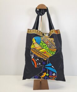 Bolsa "Turbante de la Libertad II" – Arte Textil en Mosaico Wax (Edición Negro Brillo)