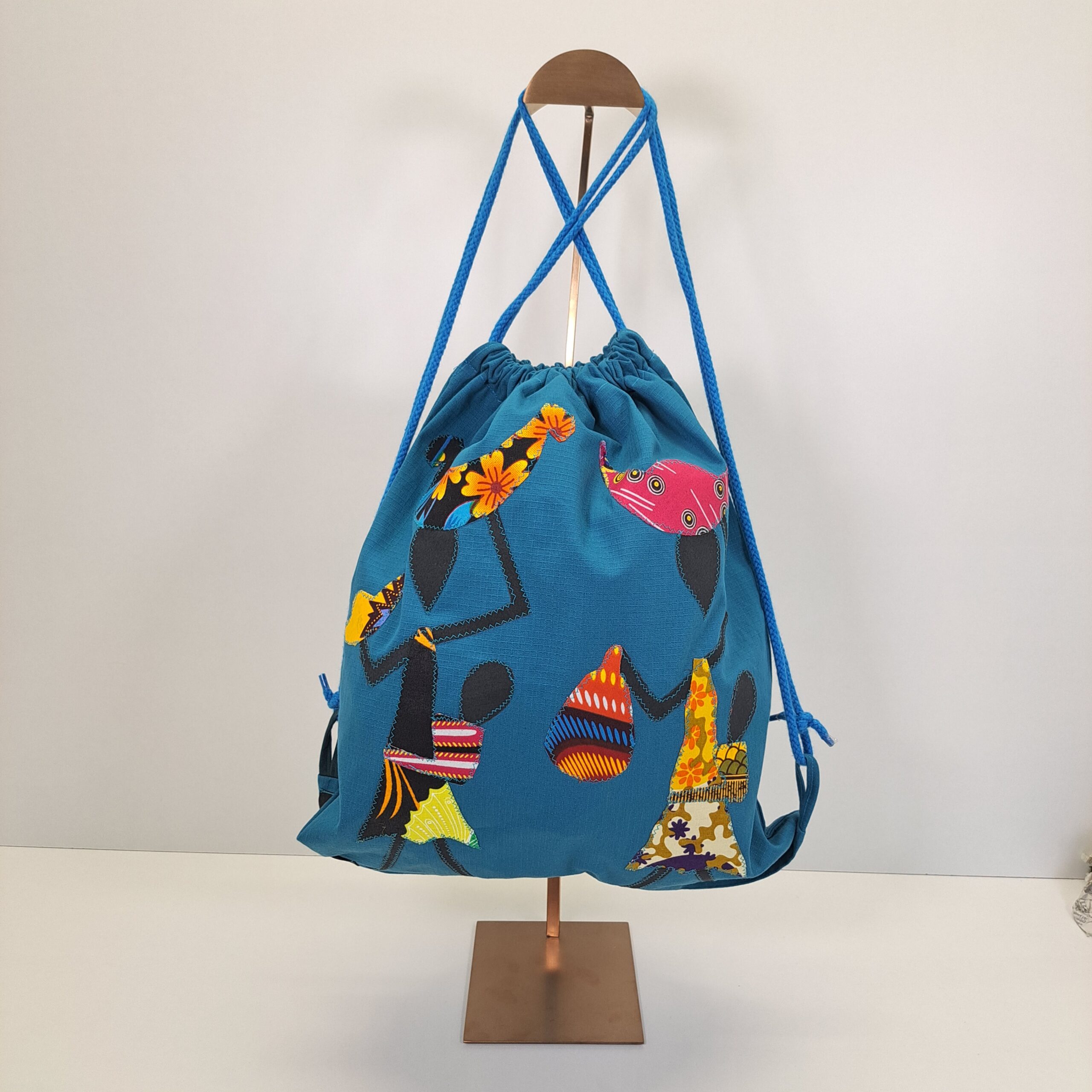 Mochila de Cordones "Mama África" – El Latido de la Vida (Azul Turquesa) - Imagen 2
