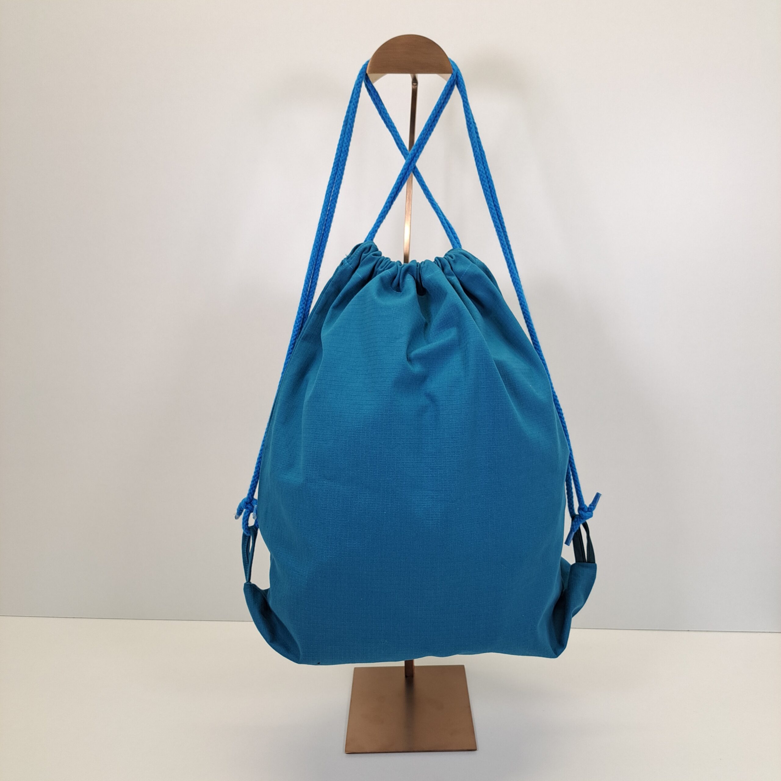 Mochila de Cordones "Mama África" – El Latido de la Vida (Azul Turquesa) - Imagen 3