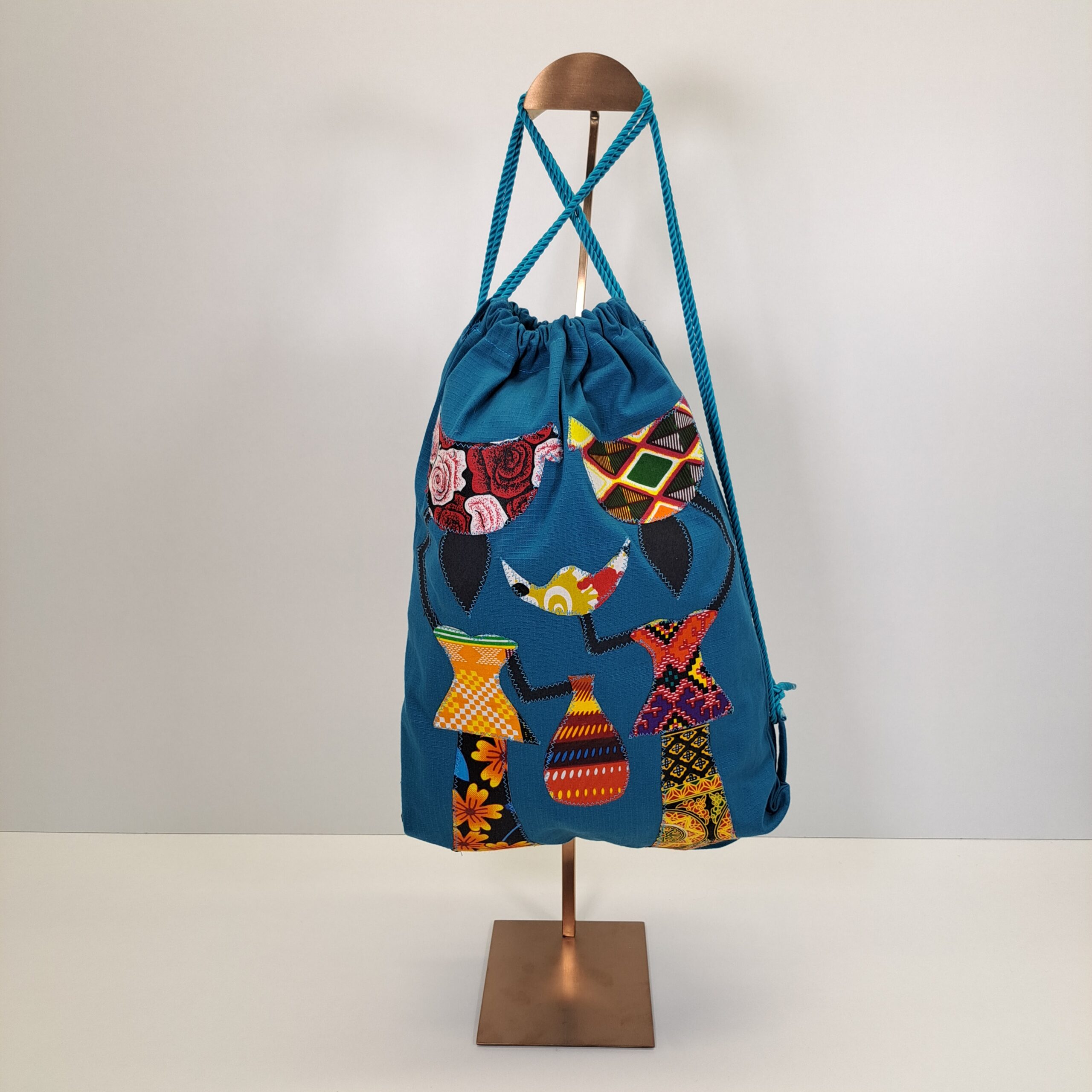 Mochila de Cordones "Teranga" – El Arte de la Bienvenida (Azul Turquesa) - Imagen 2